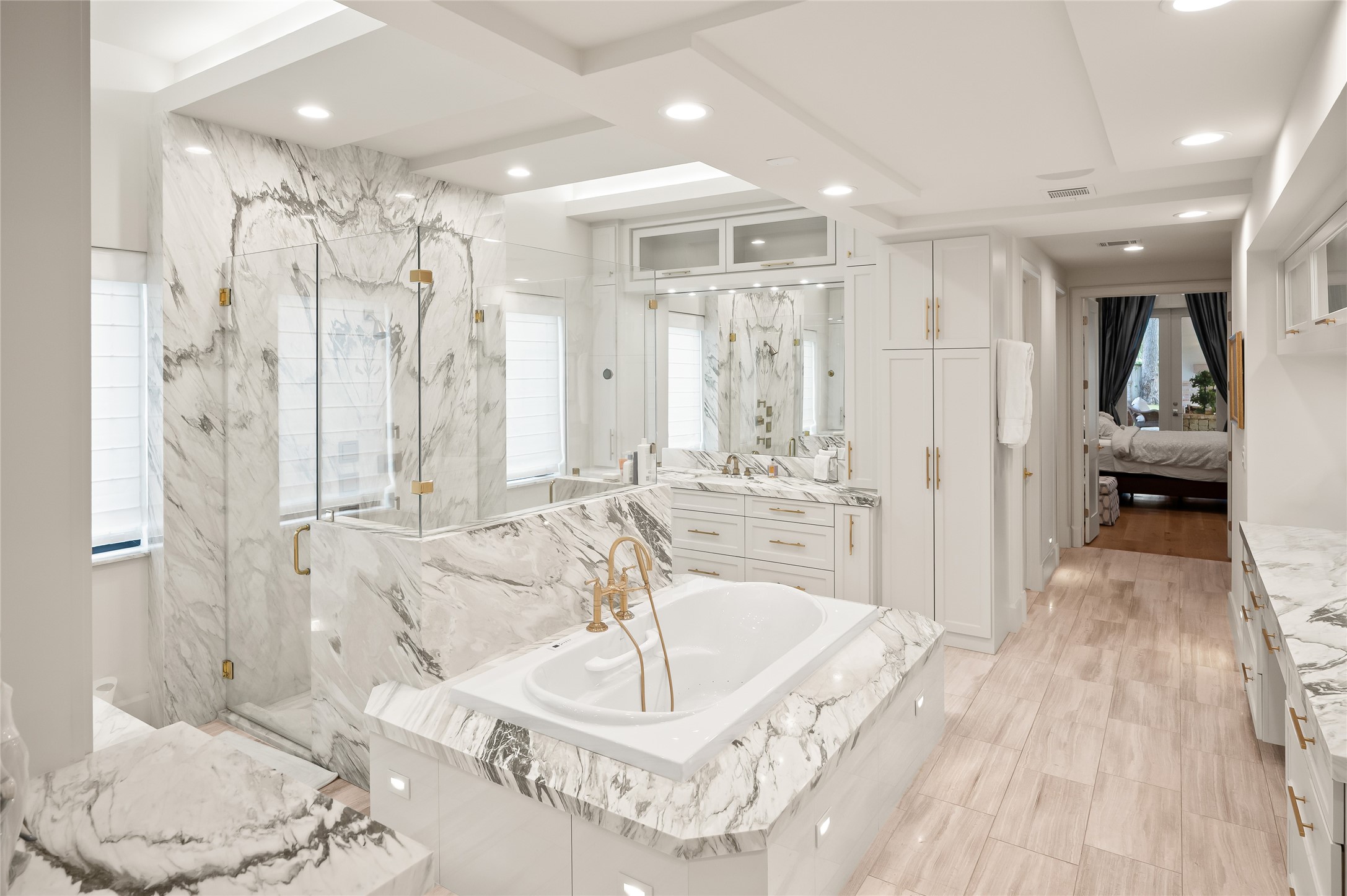 11518 Shadow Way Street Houston, TX 77024 - Photo 23 of 50 Primary Suite Bath, marble elegance paired with exquisite detailing throughout.