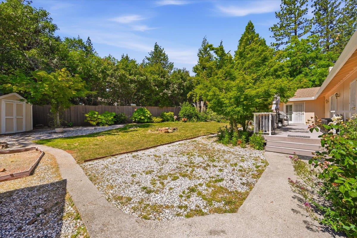 12600 Friar Tuck Road Grass Valley, CA 95949 - Photo 36 of 56 a view of a swimming pool with a patio