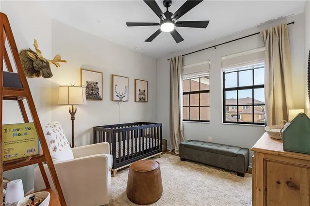 a bedroom with furniture and a window