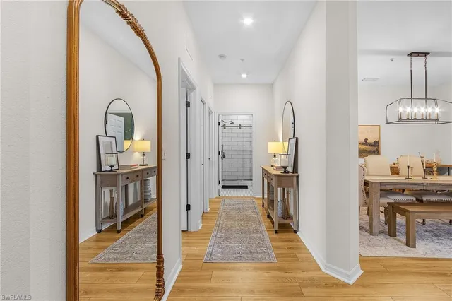 a view of a kitchen from the hallway