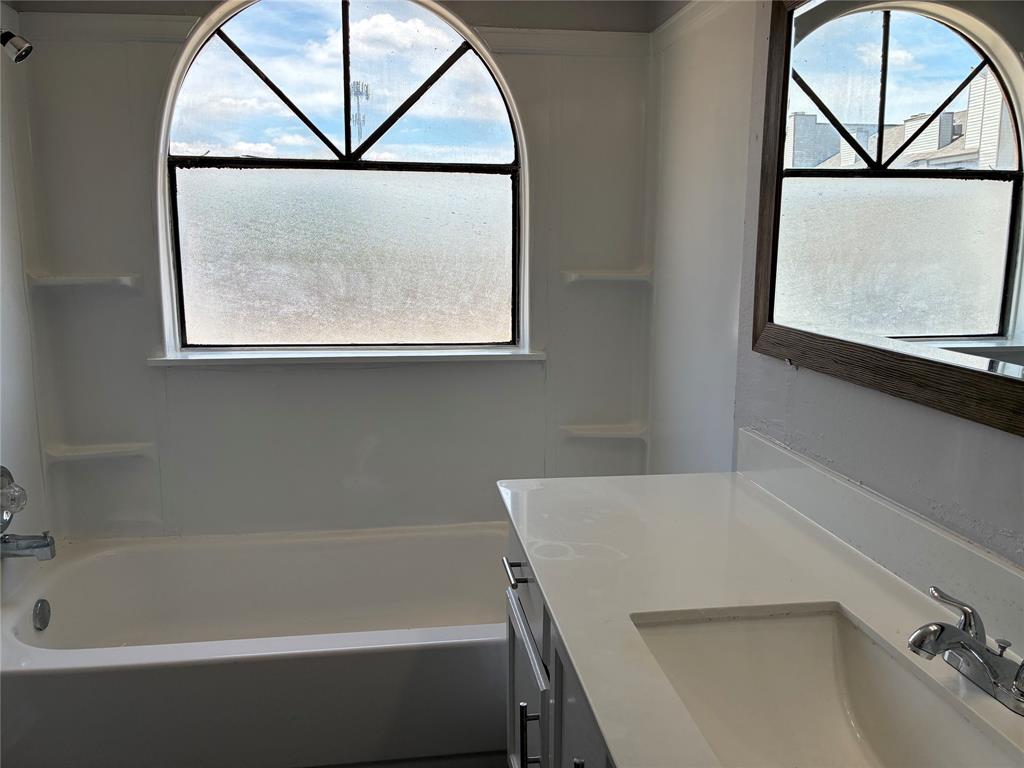 6108 Abrams Road, Unit 306 Dallas, TX 75231 - Photo 13 of 17 Bathroom featuring vanity
