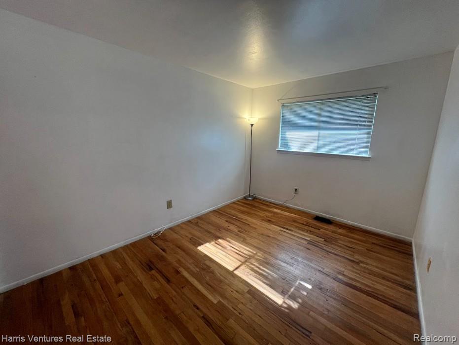 28482 Sutherland Avenue Warren, MI 48088 - Photo 15 of 25 Bedroom #2 with wood-finish flooring