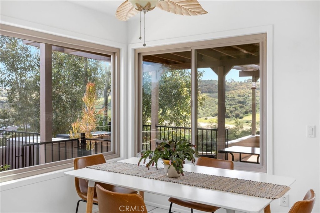 3240 Skycrest Drive Fallbrook, CA 92028 - Photo 14 of 40 a view of a dining room with furniture window and outside view
