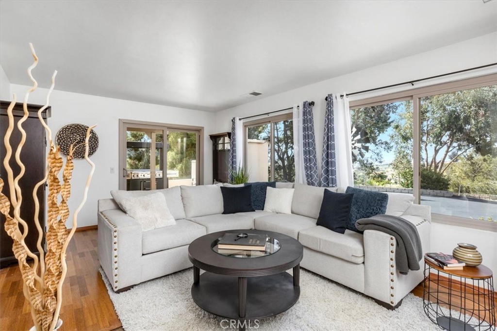 3240 Skycrest Drive Fallbrook, CA 92028 - Photo 17 of 40 a living room with furniture and a large window