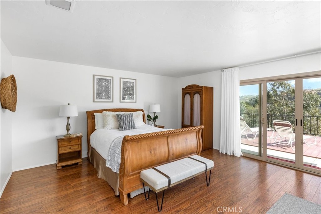 3240 Skycrest Drive Fallbrook, CA 92028 - Photo 18 of 40 a bedroom with a bed and a large window