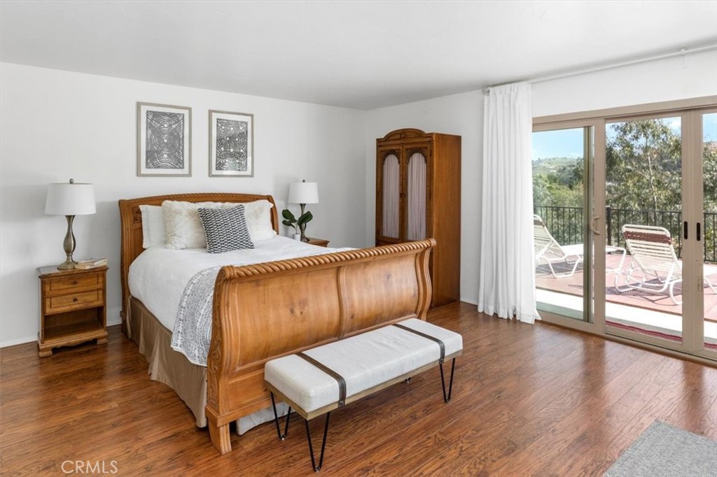 3240 Skycrest Drive Fallbrook, CA 92028 - Photo 19 of 40 a bedroom with a bed and a large window