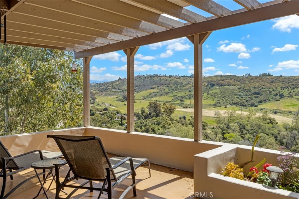 3240 Skycrest Drive Fallbrook, CA 92028 - Photo 30 of 40 a view of a two chair in the balcony