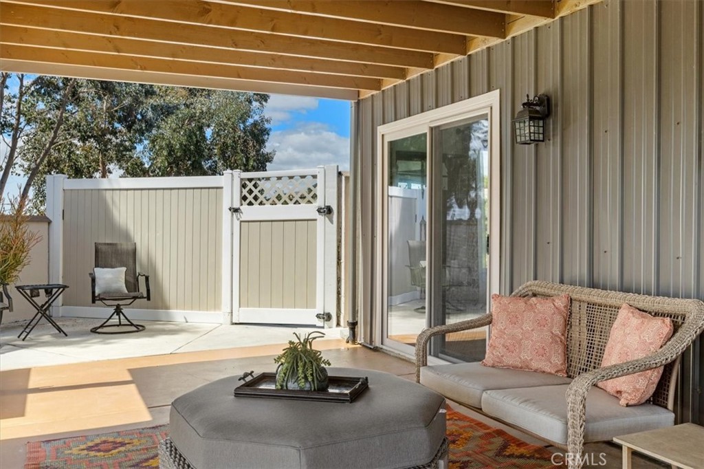 3240 Skycrest Drive Fallbrook, CA 92028 - Photo 32 of 40 a view of a patio with table and chairs and potted plants