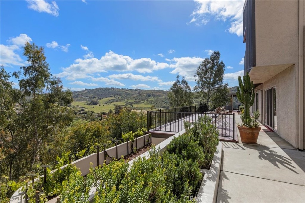 3240 Skycrest Drive Fallbrook, CA 92028 - Photo 34 of 40 a view of a balcony with lake view and mountain view