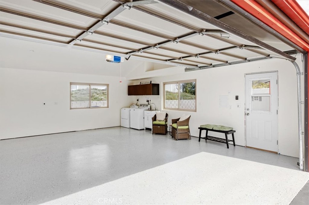 3240 Skycrest Drive Fallbrook, CA 92028 - Photo 35 of 40 a living room with furniture and a flat screen tv