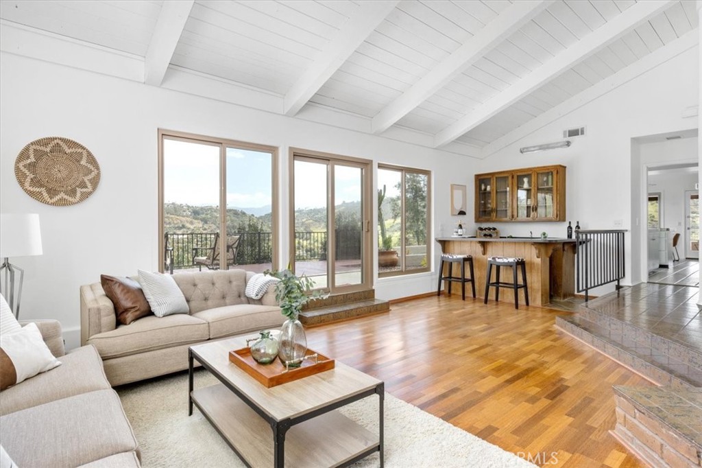 3240 Skycrest Drive Fallbrook, CA 92028 - Photo 4 of 40 a living room with furniture and a table