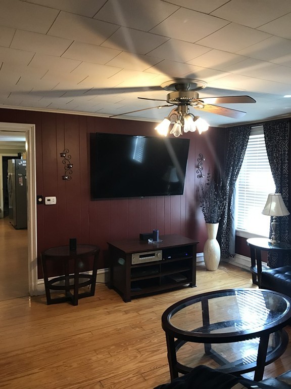 5 Oak Street Middleboro, MA 02346 - Photo 12 of 27 a living room with furniture and a flat screen tv