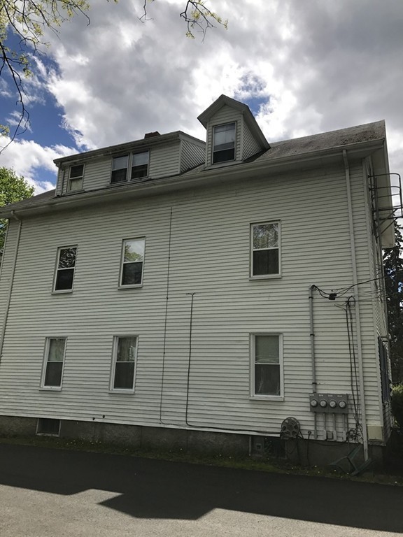 5 Oak Street Middleboro, MA 02346 - Photo 6 of 27 a side view of a house