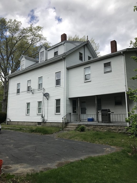 5 Oak Street Middleboro, MA 02346 - Photo 7 of 27 a front view of a house with a yard