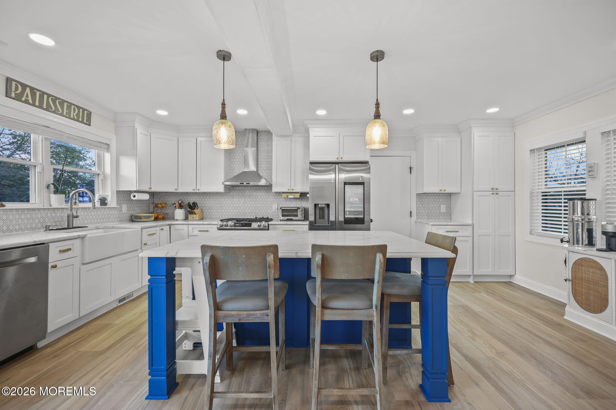 91 Davis Lane Red Bank, NJ 07701 - Photo 16 of 87 a kitchen with a dining table chairs wooden floor cabinets and appliances