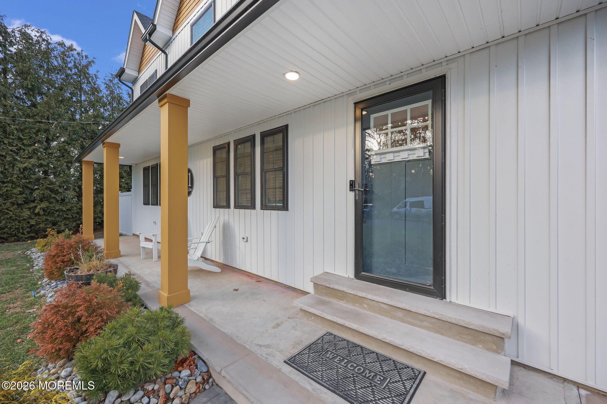 91 Davis Lane Red Bank, NJ 07701 - Photo 2 of 87 front view of a house with a glass door