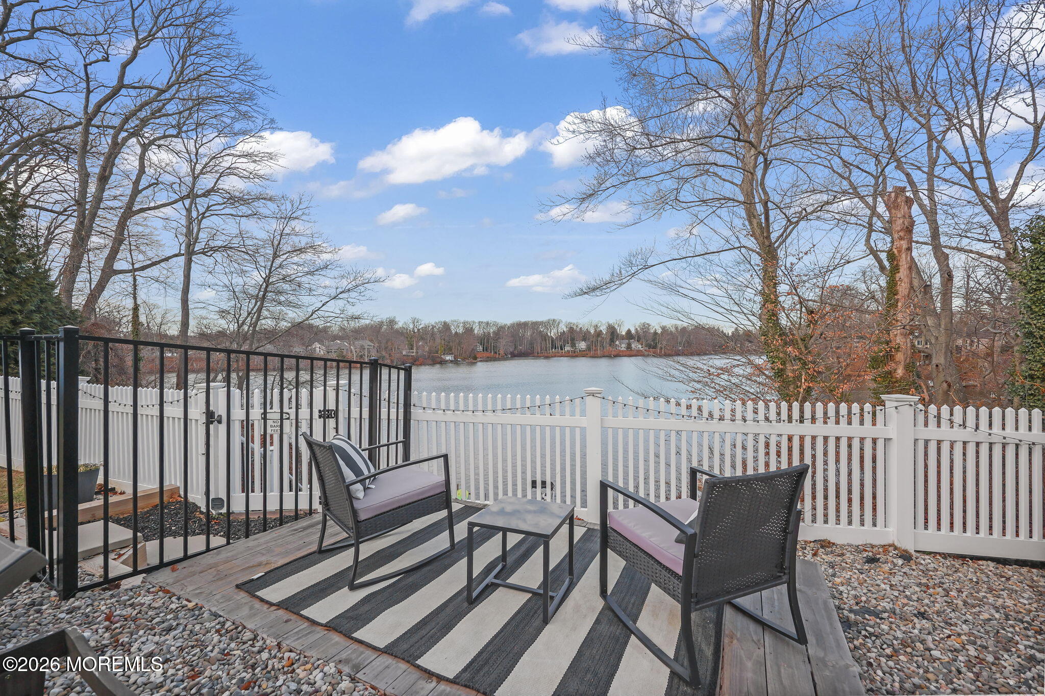 91 Davis Lane Red Bank, NJ 07701 - Photo 22 of 87 a view of a balcony with wooden floor and fence