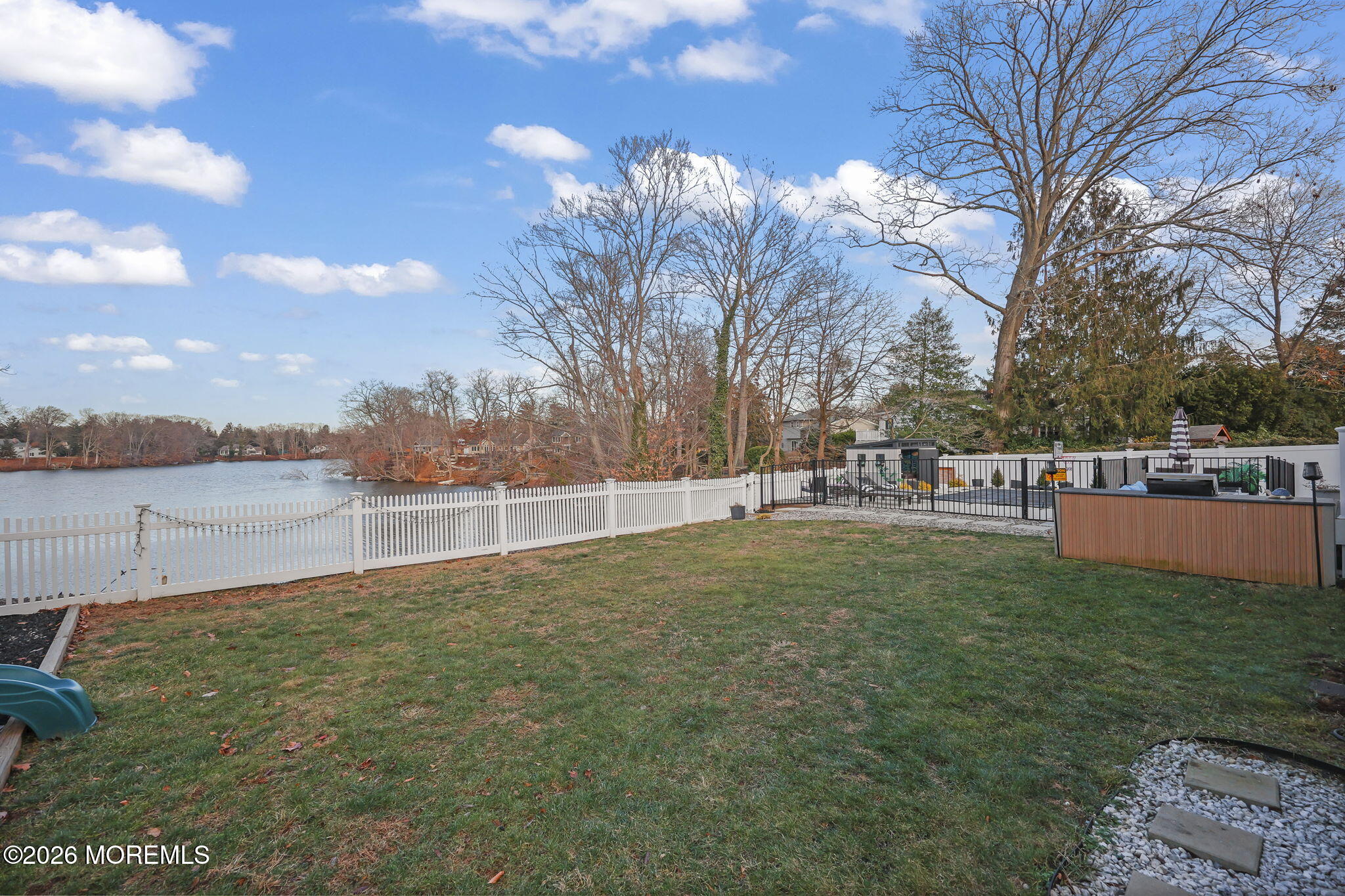 91 Davis Lane Red Bank, NJ 07701 - Photo 39 of 87 a view of yard with swimming pool and lake view