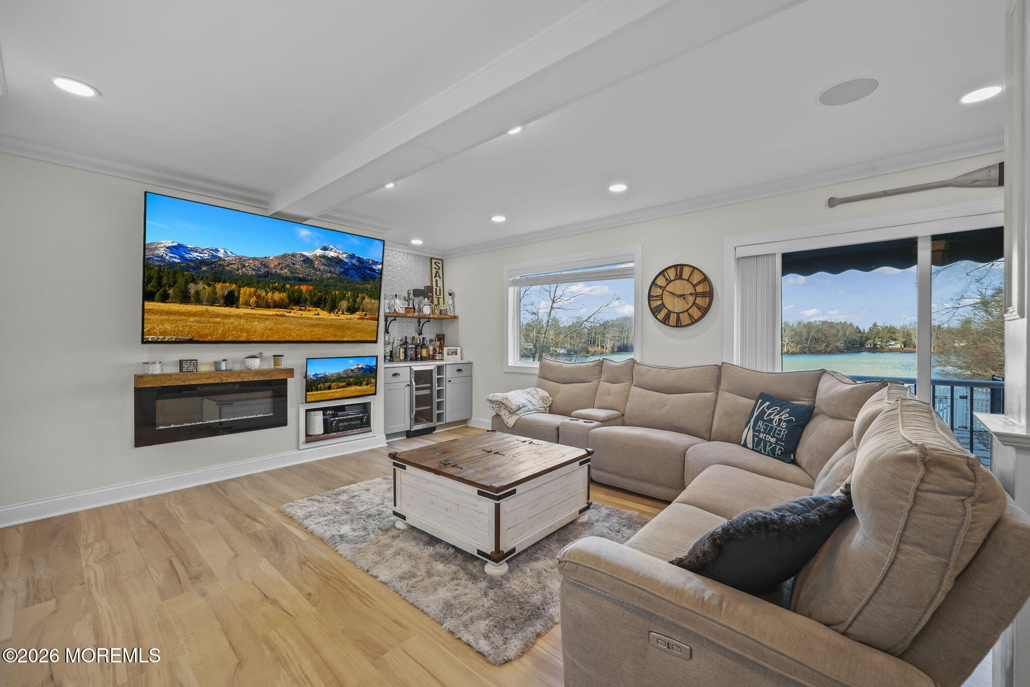 91 Davis Lane Red Bank, NJ 07701 - Photo 46 of 87 a living room with furniture and a flat screen tv