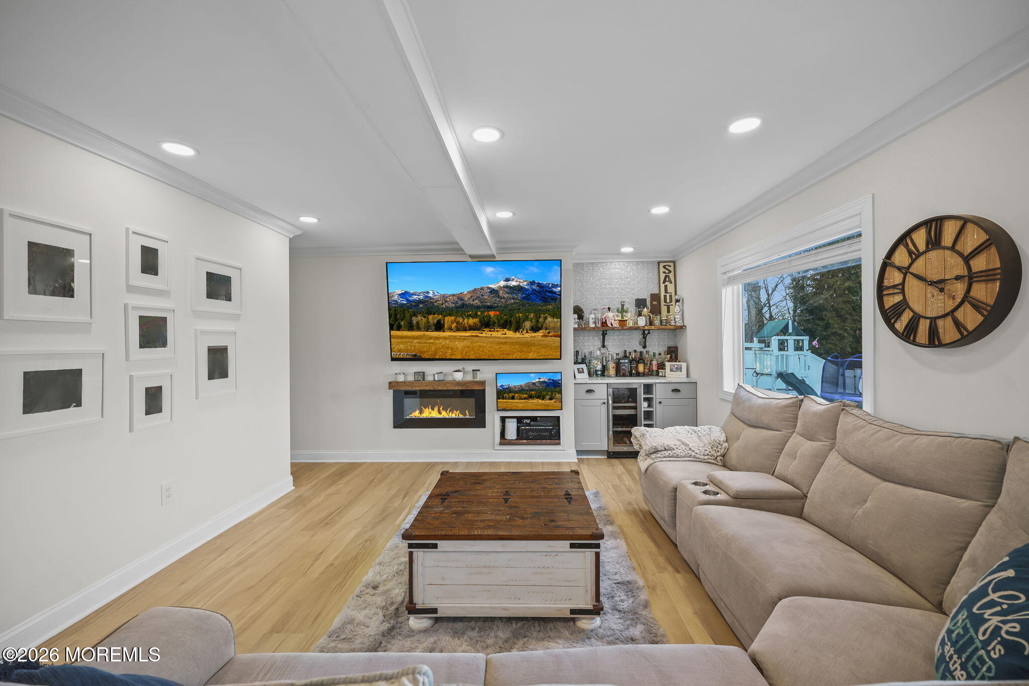 91 Davis Lane Red Bank, NJ 07701 - Photo 49 of 87 a living room with furniture and a wall painting