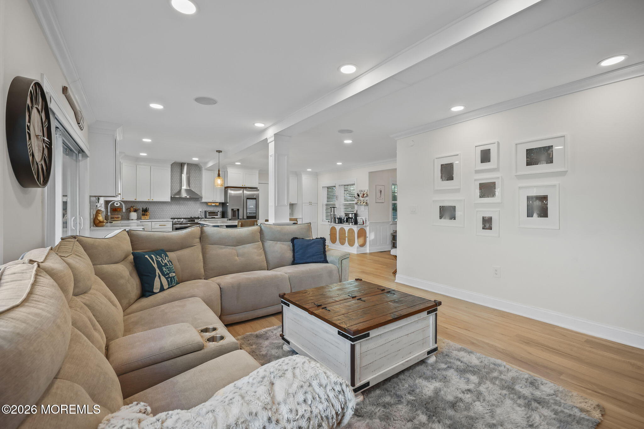 91 Davis Lane Red Bank, NJ 07701 - Photo 52 of 87 a living room with furniture wooden floor and a fireplace