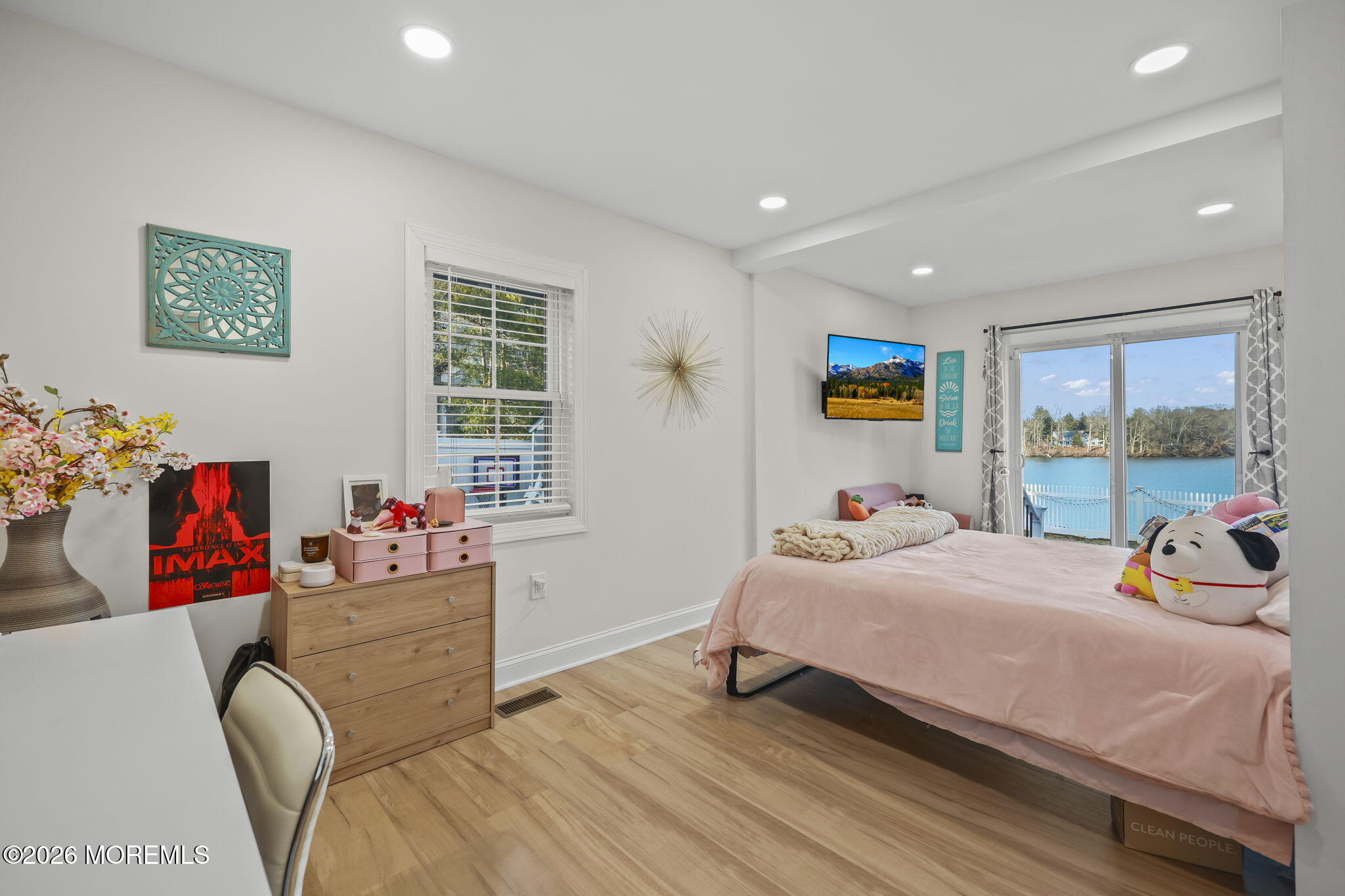 91 Davis Lane Red Bank, NJ 07701 - Photo 54 of 87 a bedroom with a bed and a large window