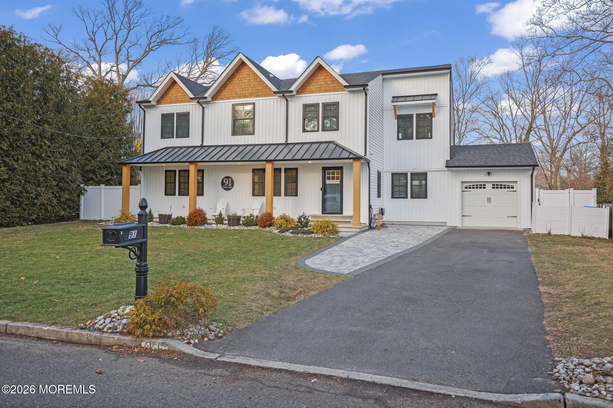 91 Davis Lane Red Bank, NJ 07701 - Photo 6 of 87 a front view of a house with a yard