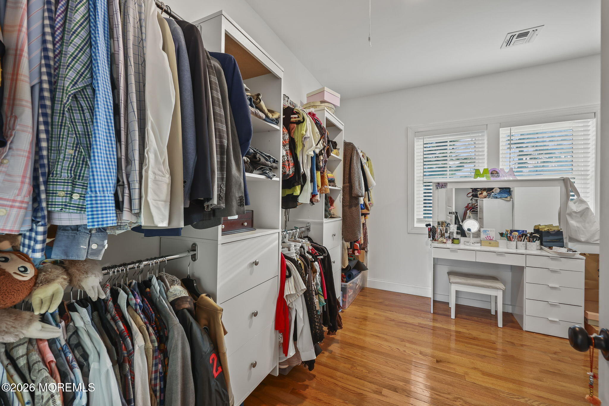 91 Davis Lane Red Bank, NJ 07701 - Photo 67 of 87 a view of walk in closet with clothes and shoes