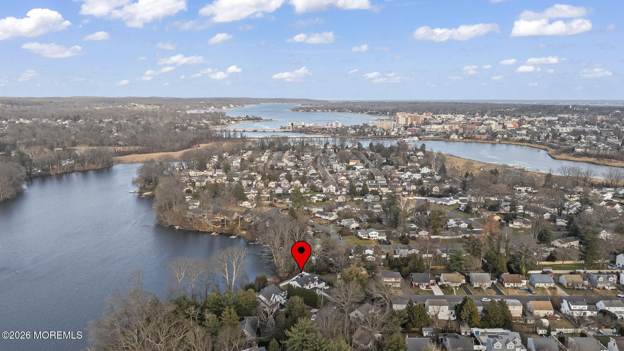 91 Davis Lane Red Bank, NJ 07701 - Photo 67 of 87 an aerial view of residential building with outdoor space and lake view in back