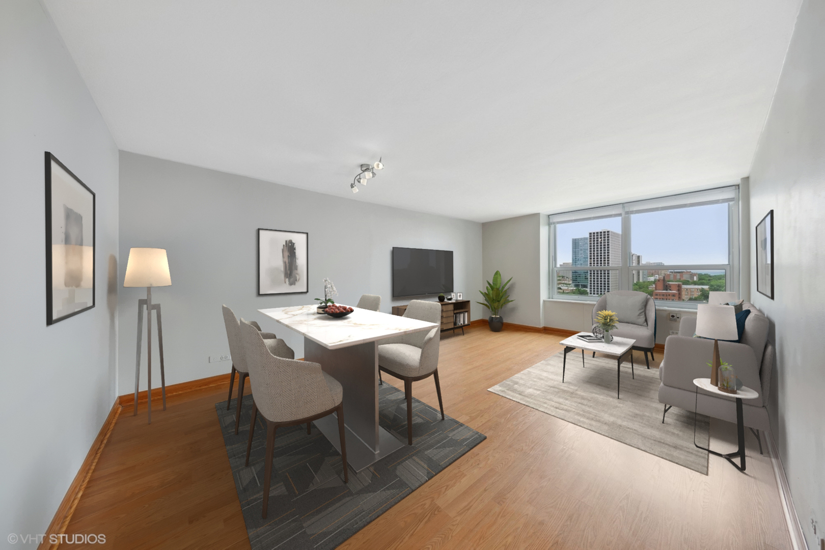 720 West Gordon Terrace, Unit 14F Chicago, IL 60613 - Photo 2 of 17 a view of a dining room with furniture window and outside view