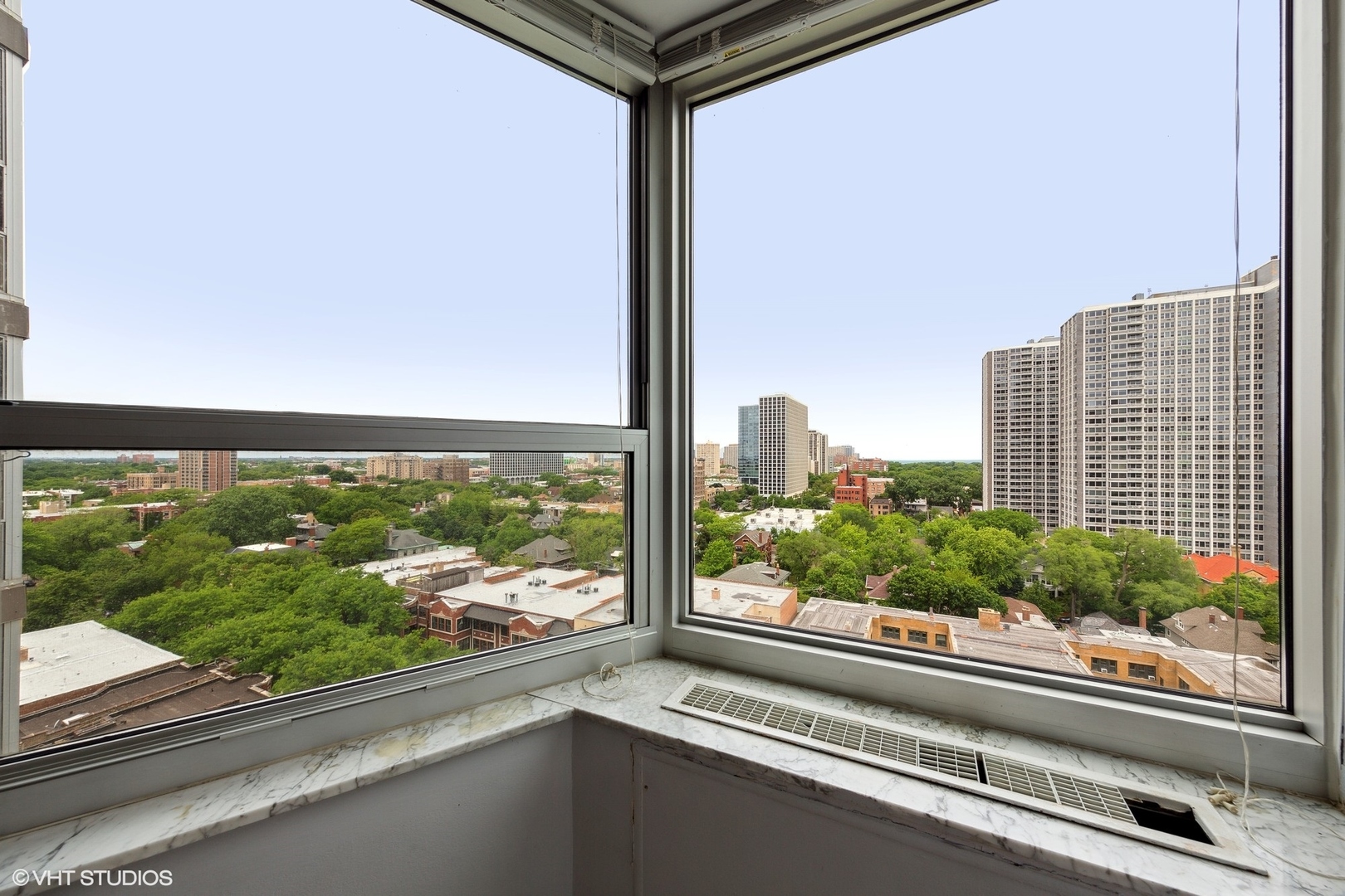 720 West Gordon Terrace, Unit 14F Chicago, IL 60613 - Photo 8 of 17 a view of a city from a window