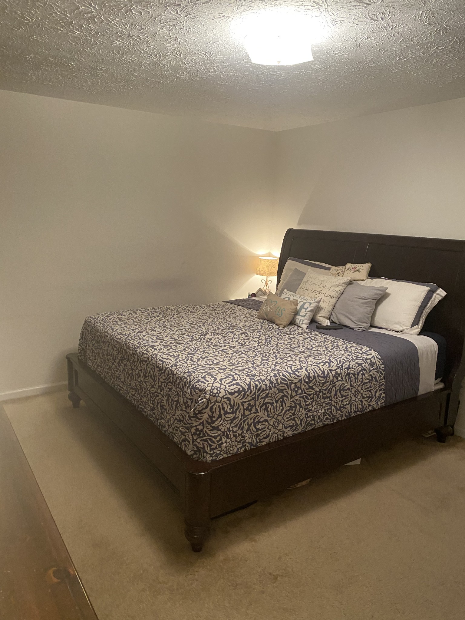 704 Neelys Bend Road Madison, TN 37115 - Photo 11 of 15 a bedroom with a bed and dresser