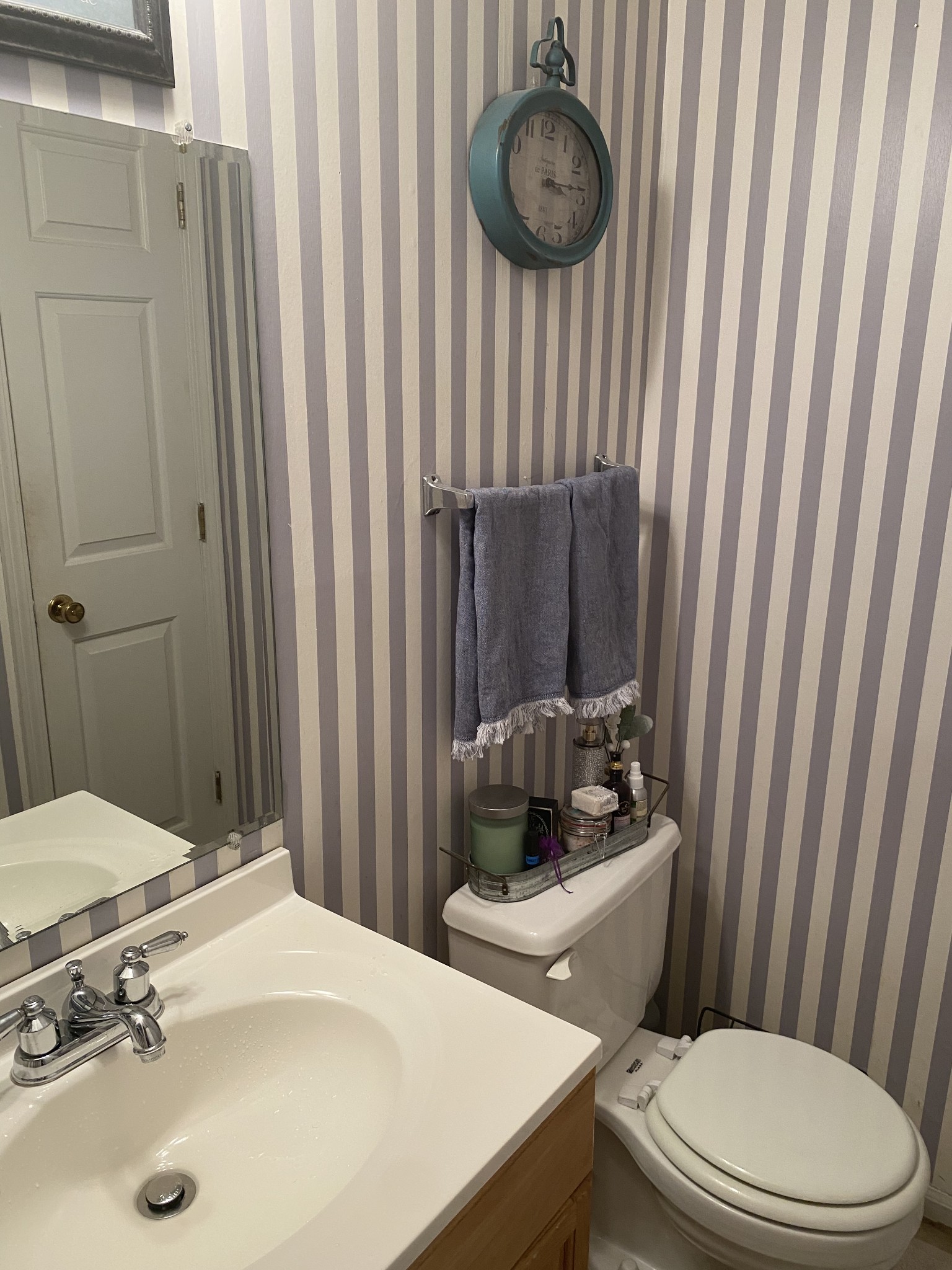704 Neelys Bend Road Madison, TN 37115 - Photo 10 of 15 a bathroom with a sink a toilet and shower curtain