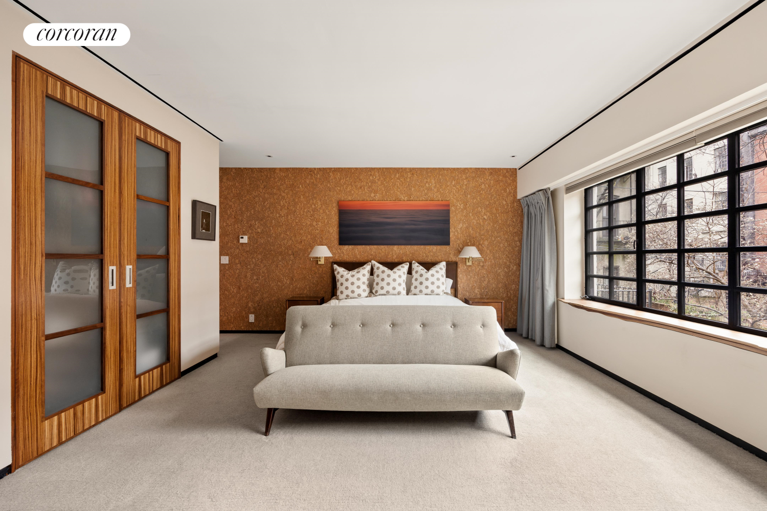 52 Sidney Place Brooklyn, NY 11201 - Photo 12 of 28 a spacious bedroom with a bed and a large window