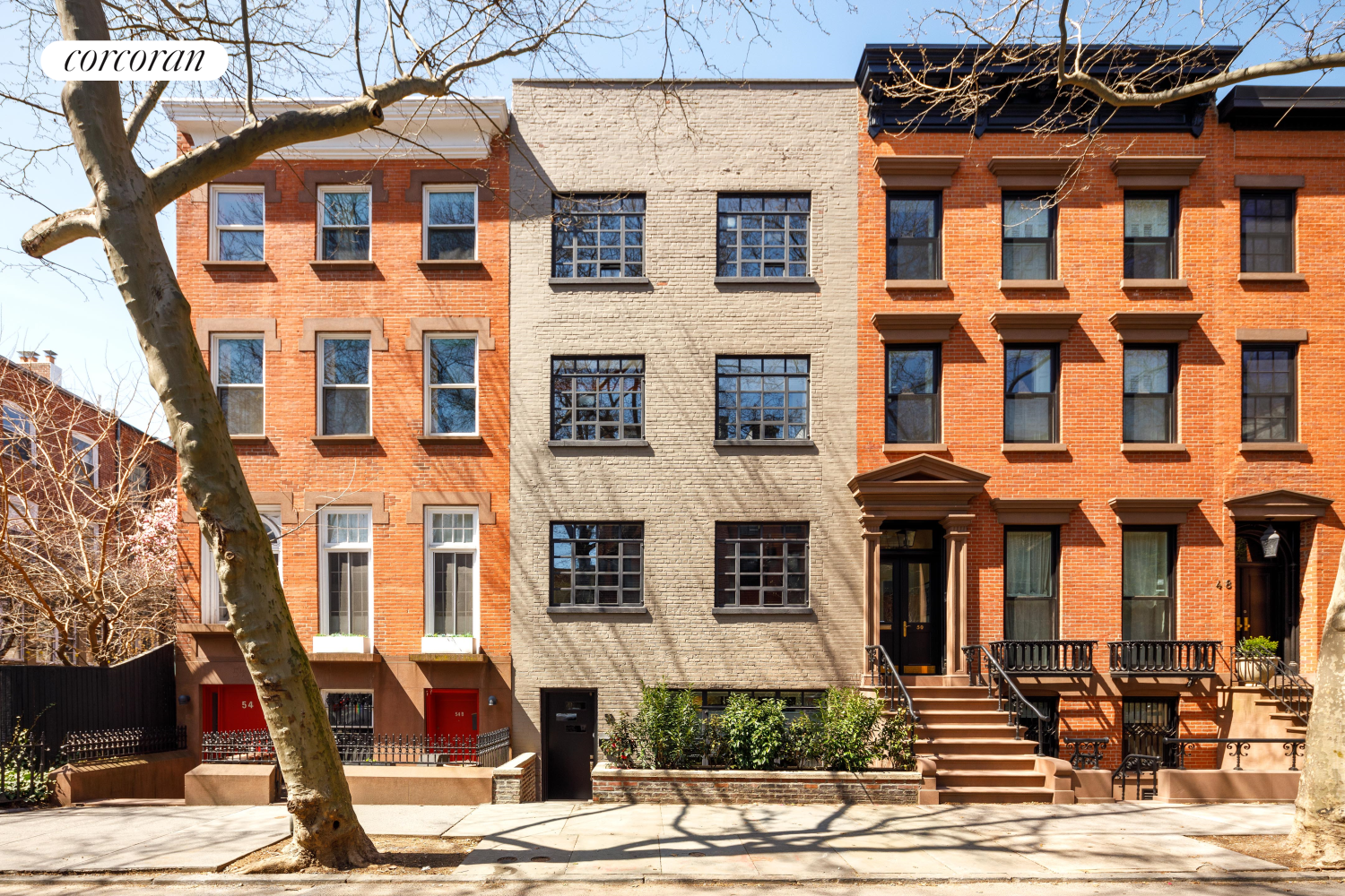 52 Sidney Place Brooklyn, NY 11201 - Photo 28 of 28 a front view of a building with street view