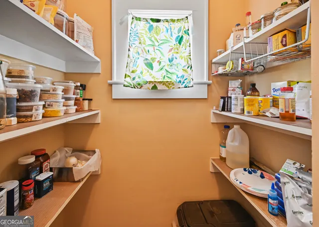 a room with storage and utility