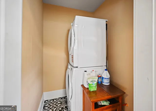 a bedroom with a bed and a walk in closet