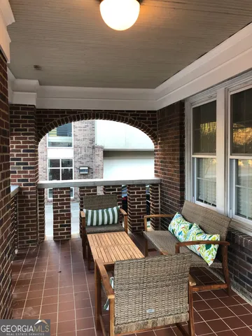 a front view of a house with patio