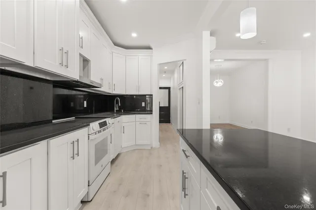 a large kitchen with cabinets
