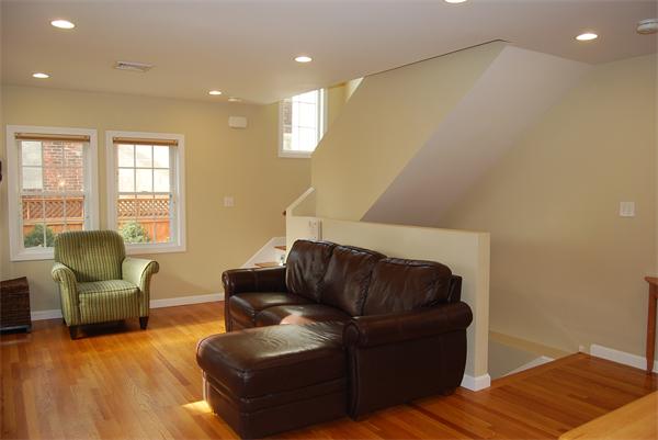349 Norfolk Street, Unit R Cambridge, MA 02139 - Photo 3 of 11 a living room with furniture window and a couch