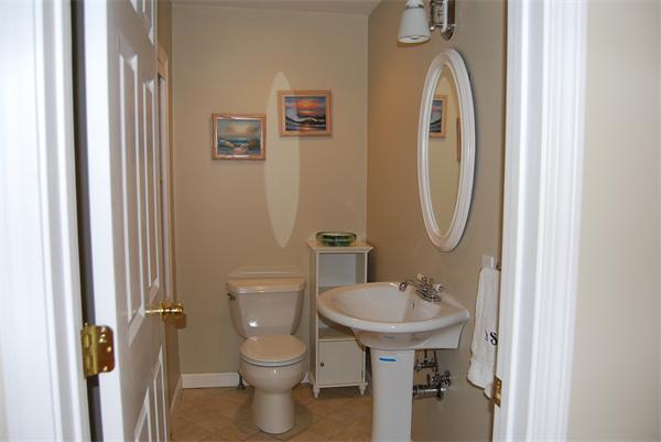 349 Norfolk Street, Unit R Cambridge, MA 02139 - Photo 5 of 11 a bathroom with a sink mirror and toilet