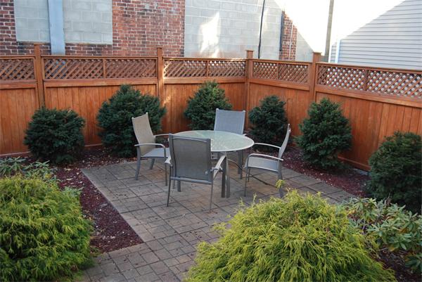 349 Norfolk Street, Unit R Cambridge, MA 02139 - Photo 10 of 11 a view of a chairs and table in the patio