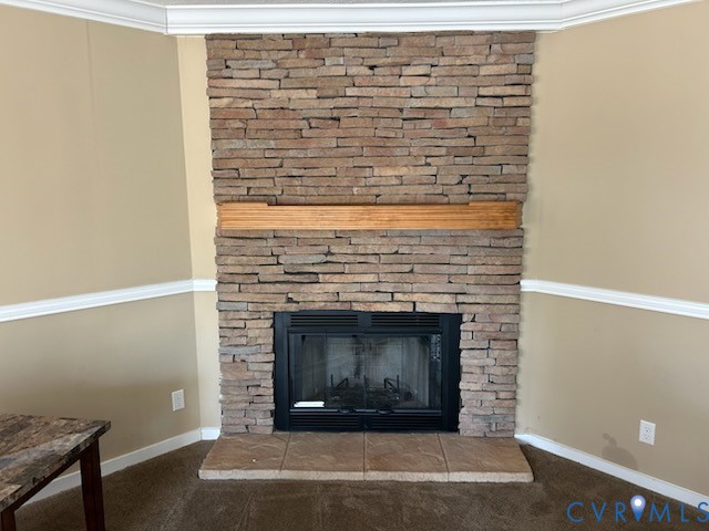 15910 Nobles Road Disputanta, VA 23842 - Photo 4 of 38 Detailed view of ornamental molding, a fireplace,