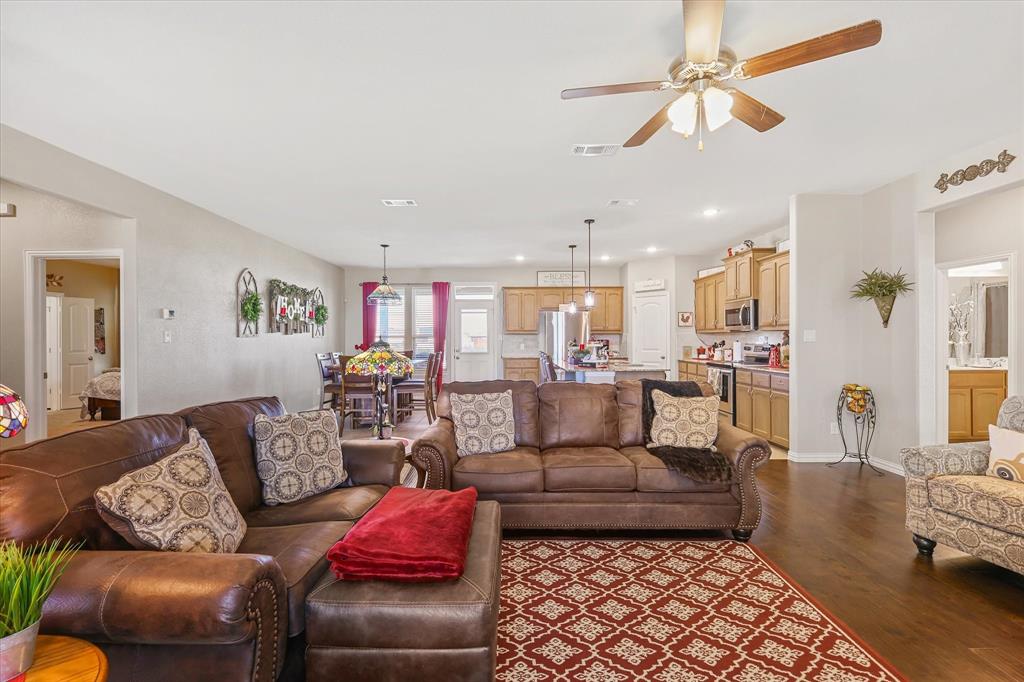 2375 County Road 4010 Decatur, TX 76234 - Photo 6 of 34 Living area with dark wood finished floors, a ceiling fan, and recessed lighting