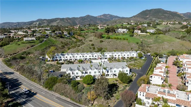 an aerial view of residential house with outdoor space