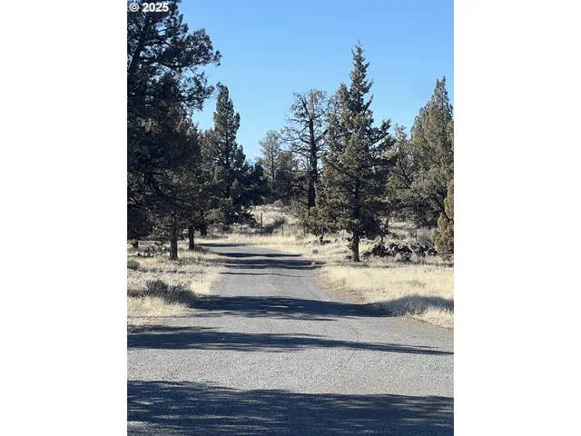 a picture of car parked on top of a road
