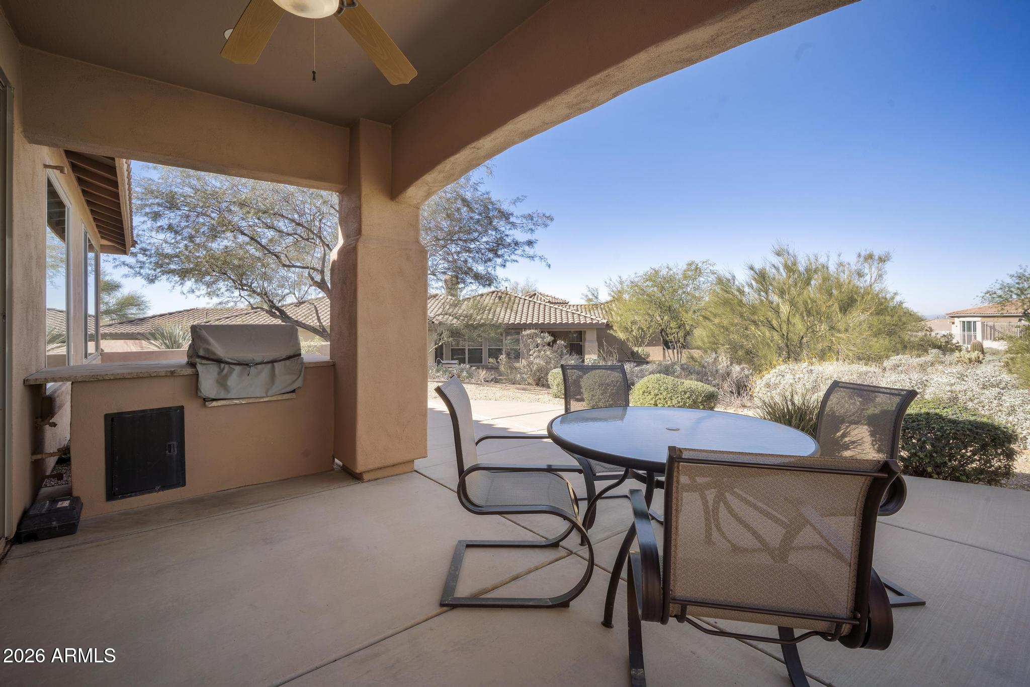 11448 East Raintree Drive Scottsdale, AZ 85255 - Photo 16 of 37 a outdoor dining space with furniture and city view