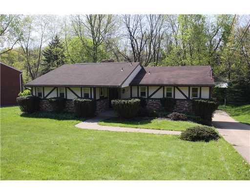 Exterior Front. Charming Inside & Out, this wonderful Ranch home is situated on a private & wooded lot in one of Moon Township s most desirable communities; Wyngate!  Well Maintained... Move-in Condition!
