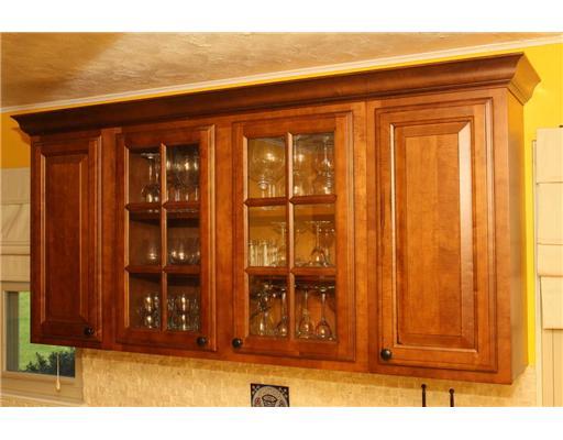 Kitchen. Decorative Glass doors & wine rack.... Nice!