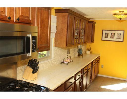 Kitchen. This Kitchen is HUGE! All the Appliances are Stainless Steel & included in the sale of this home.